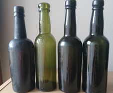 Lot of 4 vintage Guinness bottles