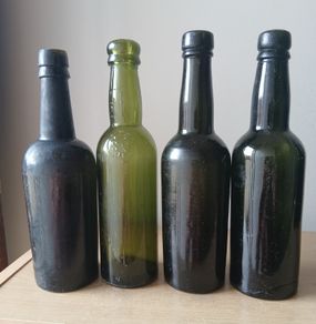 Lot of 4 vintage Guinness bottles