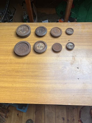 8 old scales weighs