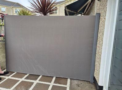Awning privacy wall.