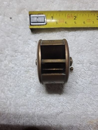 Antique fly fishing reel shaped tape measure