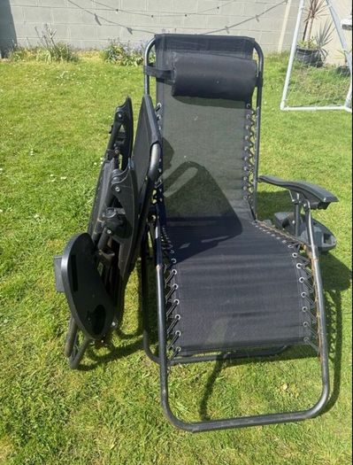 2 black recliner garden chairs