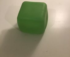 Green squishy glow in the dark cube