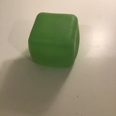 Green squishy glow in the dark cube