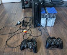 Classic Sony PlayStation 2 (PS2) Fat Bundle | 2 Controllers, 8MB Memory Card & 11 Games