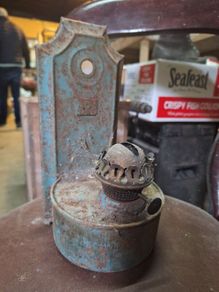 Vintage wall-mounted kerosene lamp