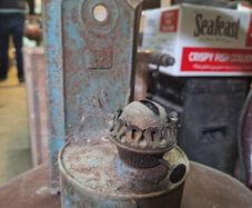 Vintage wall-mounted kerosene lamp