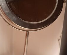 Double sided magnifying vanity mirror