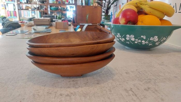 Lovely Set of Four Vintage Mid Century Modern Hand-Carved Wood Nibbles Bowls in Excellent Condition.