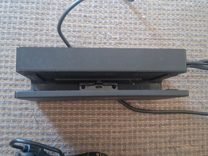 Portable Nitendo Switch, charging dock.