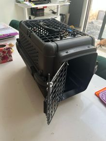 Puppy crate + harness, jacket etc