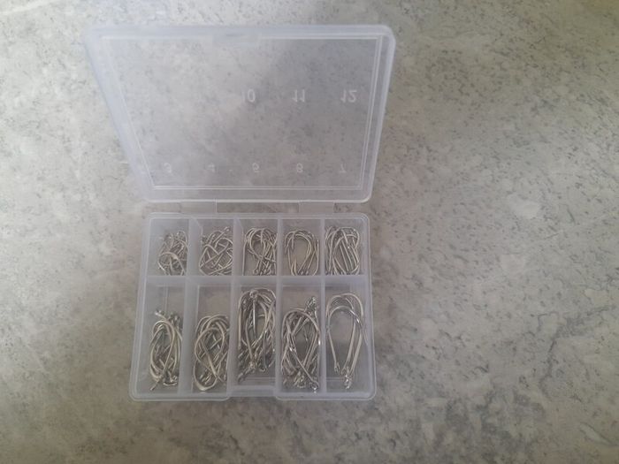 2 Boxes of small fishing hooks
