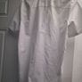Mans white shirt... Image 6
