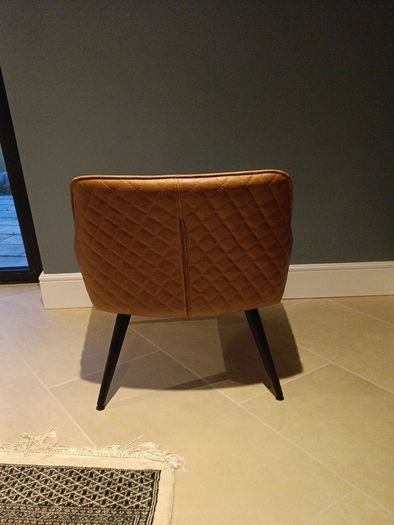 Faux leather armchair