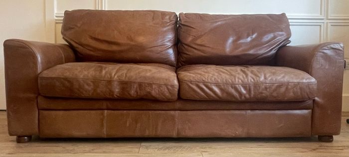 brown leather couches x 2 - will sell separately 650 each