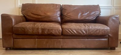 brown leather couches x 2 - will sell separately 650 each