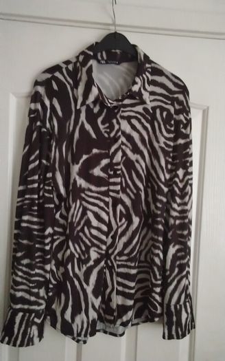 Blouse. Size: Large UK