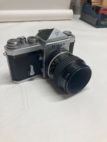Nikon F SLR with 55mm lens