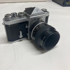 Nikon F SLR with 55mm lens