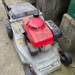 2 Petrol Lawnmowers - Free to take together