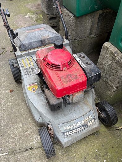 2 Petrol Lawnmowers - Free to take together
