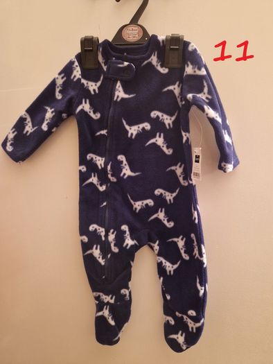 A selection of brand new baby clothes and items