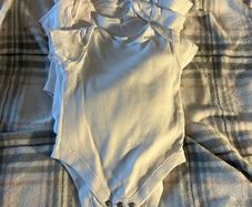 new vests 9/112 mths