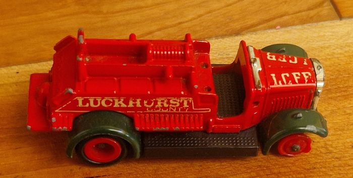 4 vintage toy cars -