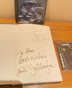 Oasis Signed Books + Cd matching book + New interview disc + live show cd