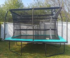 Large Trampoline with Safety Net. Excellent Condition