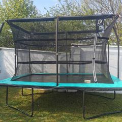Large Trampoline with Safety Net. Excellent Condition