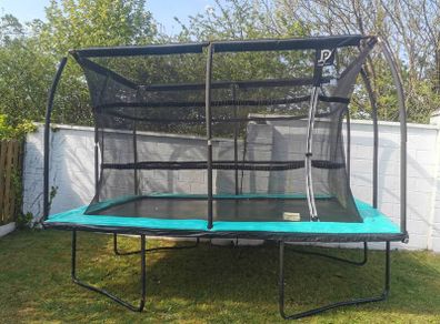 Large Trampoline with Safety Net. Excellent Condition