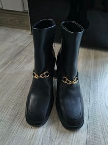 Rita  Ora black boots