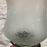 Early Edwardian oil lamp with cast metal base. Image 4