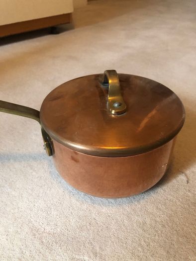 Vintage castle copper saucepans