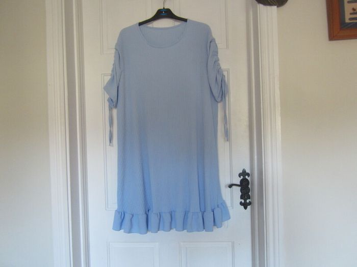 Baby blue     size 20/22
