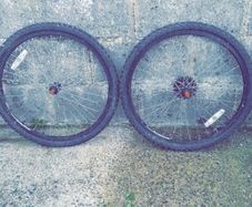 Two matching bicycle wheels