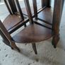 Vintage round nest of tables central round table four pie slice nesting tables tucked underneath Image 4