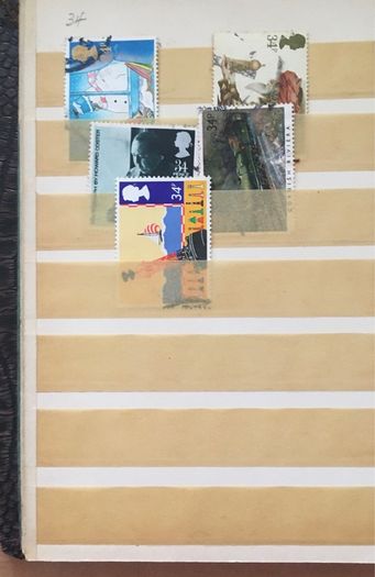 Small brown stamp stock book. 13cm x 18.5cm. 24 page / 12 leaf. Album contains used England Stamps with values over 29p