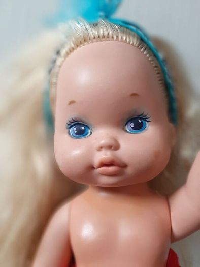 collectable vintage matel doll in original clothes