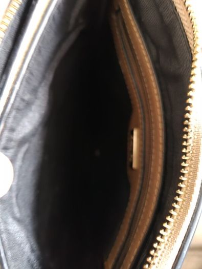 Liberty by Gionni genuine leather handbag in very good condition with lots of pockets zipped closures and adjustable shoulder strap one small mark see fourth last photo and see last three photos for exact measurements FREE TRACKED POSTAGE INCLUDED
