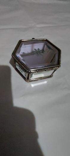 Lovely jewellery box ,,with bevelled mirrors sides and design, see pictures for condition,,take as is ,buyer collects or pays postage thank you