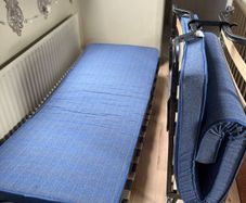 2 x fold-up single beds