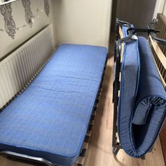 2 x fold-up single beds