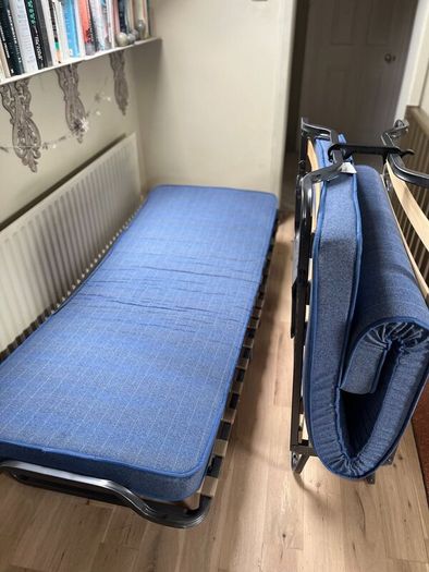 2 x fold-up single beds