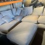Grey corner sofa with scatter cushions and footstool Image 5
