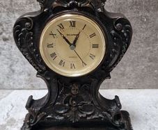 Wood bronze clock