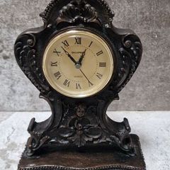 Wood bronze clock