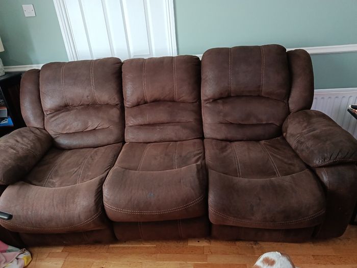 Brown fabric reclining sofa and armchair