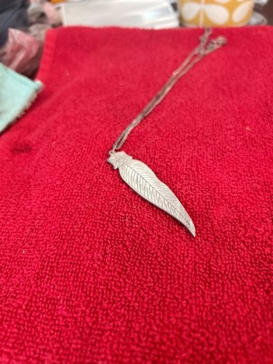 silver feather pendant and chain